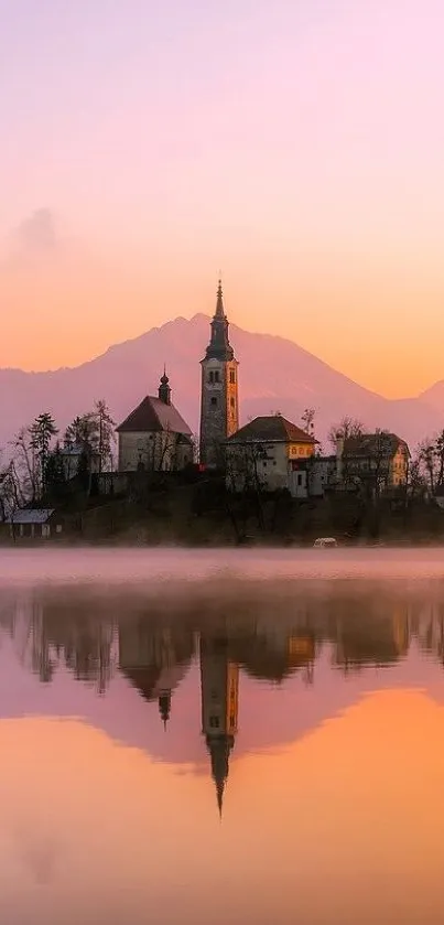 Serene church and island reflection at sunset.