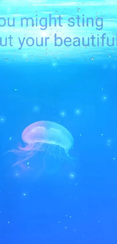 Serene jellyfish swimming in a vibrant blue ocean wallpaper.