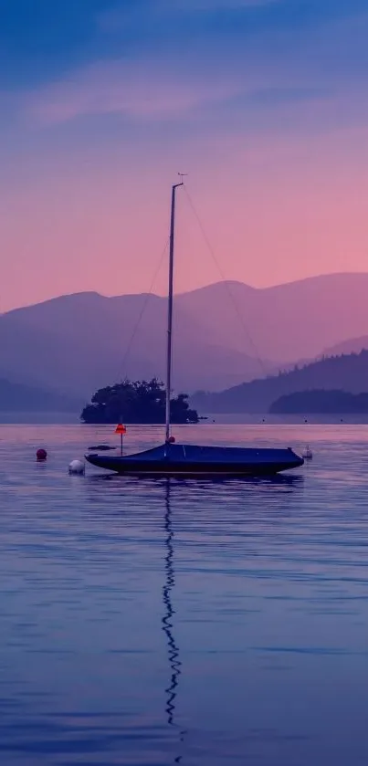 Peaceful sailboat on a lake at sunset with mountain silhouette.