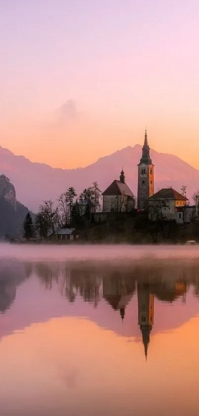 Lake reflection with church at sunrise wallpaper.