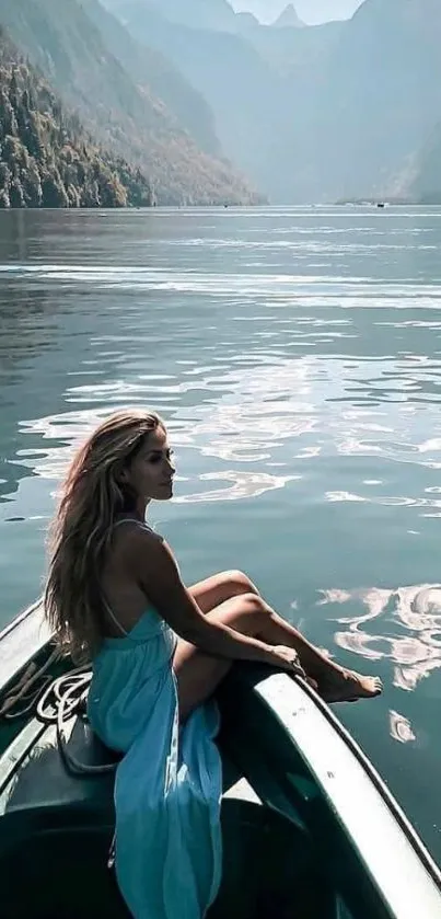 Woman in a blue dress sitting on a boat in a scenic mountain lake view.