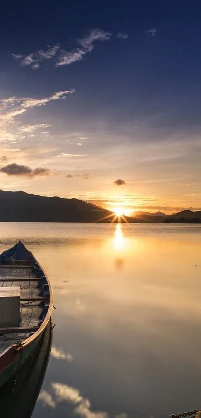 A serene sunset over a lake with a boat and mountain silhouette.