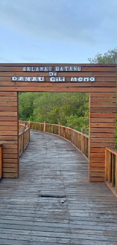 Lakeside boardwalk at Danau Gili Meno in a serene natural setting.