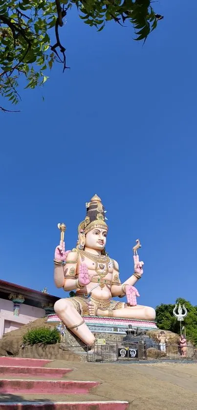 Serene Lord Shiva statue under a clear blue sky.