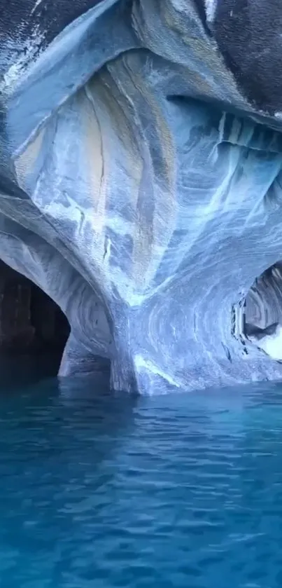 Tranquil blue waters flow through scenic marble caves.