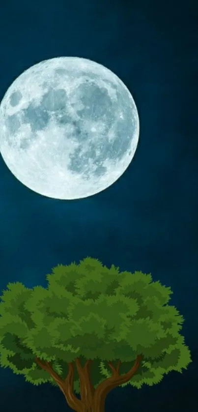 Full moon and tree under a deep blue night sky.