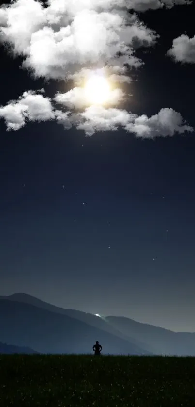 Calming moonlit nightscape with mountains and starlit sky.