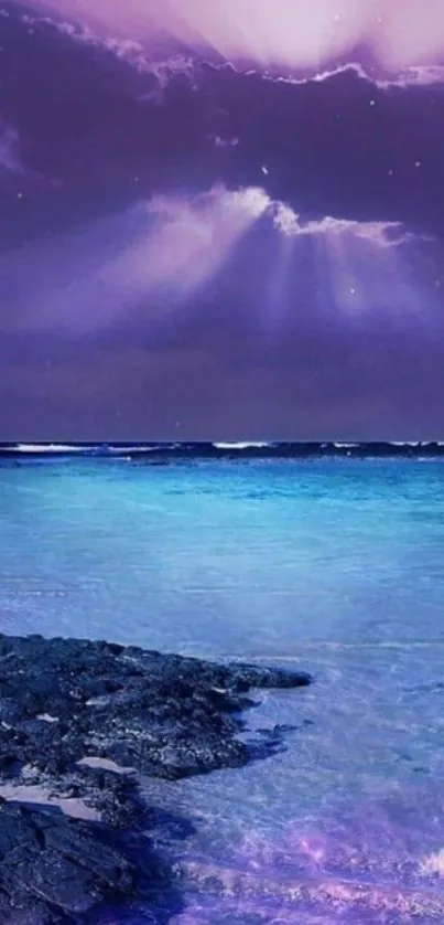 Purple night sky over a calm ocean with moonlight reflection.