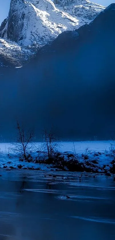 Tranquil winter mountain with snow and frozen lake landscape.