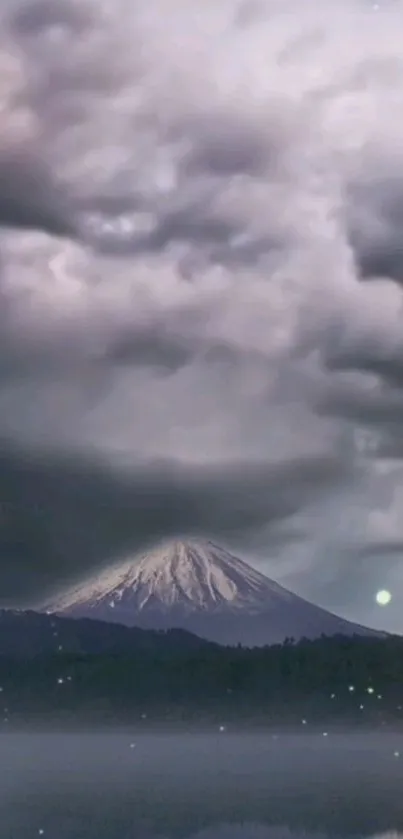 Majestic mountain with dramatic cloudy sky wallpaper.