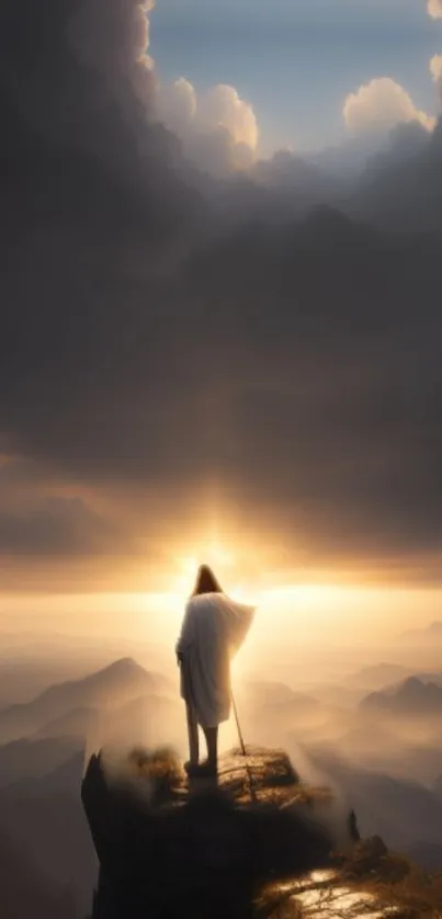 Lone figure on mountain at golden sunrise.