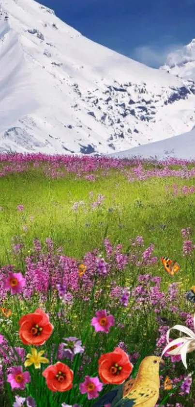 Snow-capped mountains with colorful flowers in foreground.