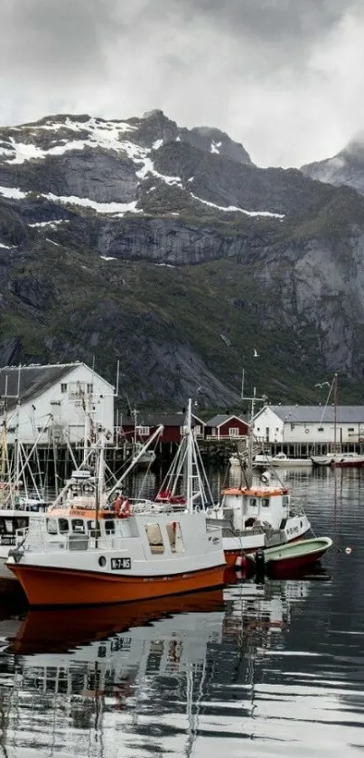 Serene harbor with boats and mountains.