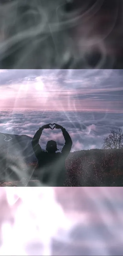 Silhouette forming heart against mountain cloudscape.