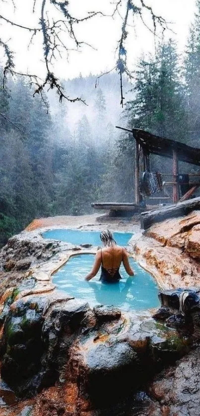 Woman relaxing in mountain hot springs with forest backdrop.