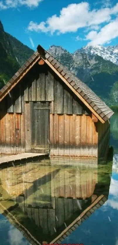 A tranquil lake with mountains and a wooden cabin, perfect for a serene escape.