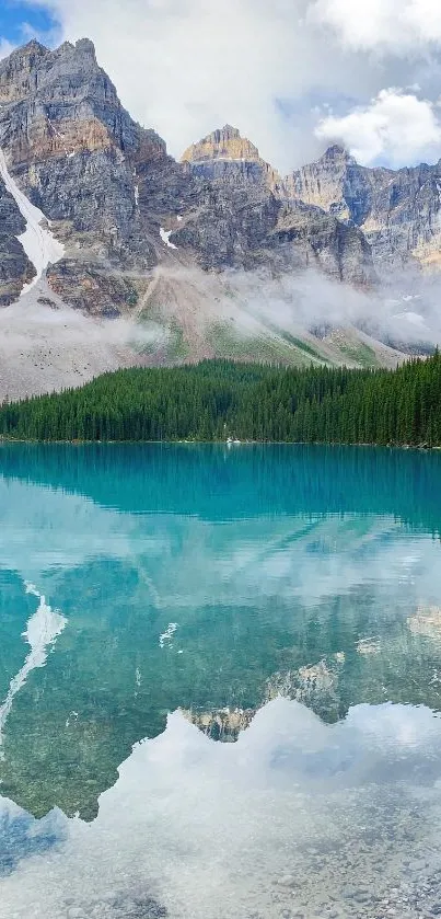 Stunning mountain lake with clear blue reflection and lush green forest.