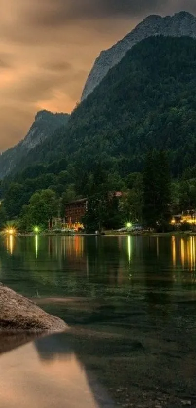 Peaceful mountain lake at sunset with vibrant reflections.