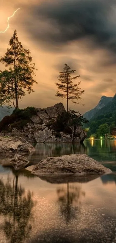 Sunset over mountain lake with reflections, trees and cloudy sky.