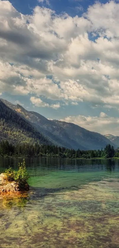 Serene mountain lake with clear water and lush green surroundings.