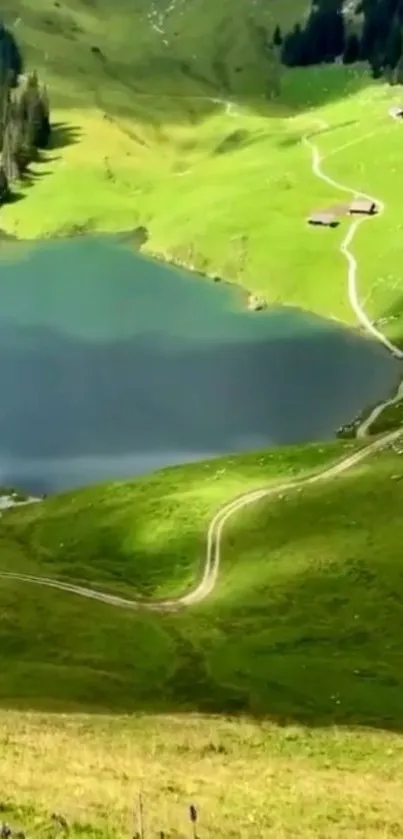 Serene mountain lake with lush green hills and cozy cabins.