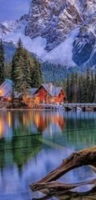 Serene mountain lake with cabin and snowy peaks reflecting in water.