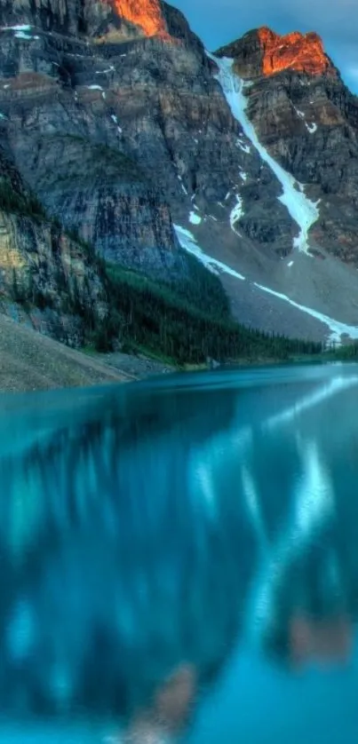 Mountain lake with serene reflections and blue hues.