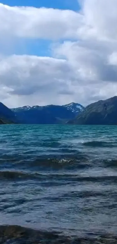 Serene mountain lake with clear skies.