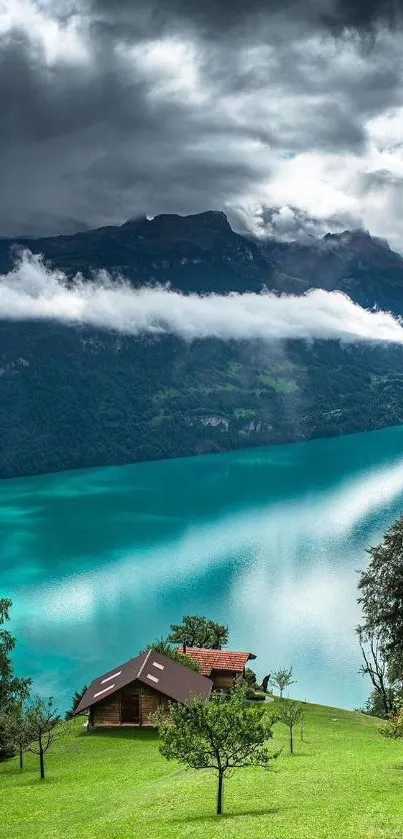 Peaceful mountain lake wallpaper with turquoise waters and an alpine hut.