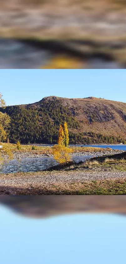 Serene autumn landscape with mountain and lake.