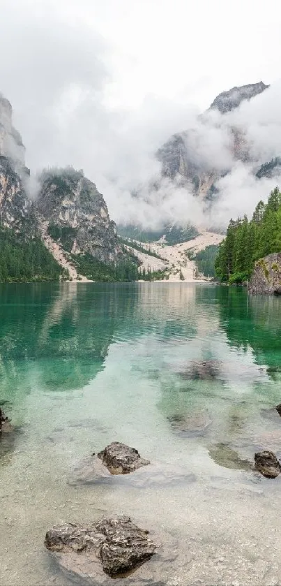 A serene mountain lake with misty forests and calm waters.