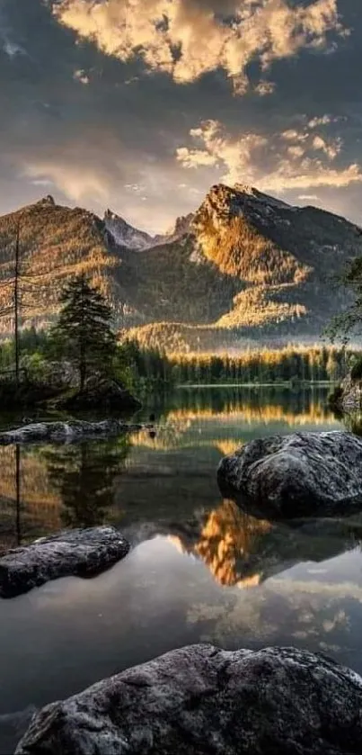 Serene mountain lake at sunset with reflections.