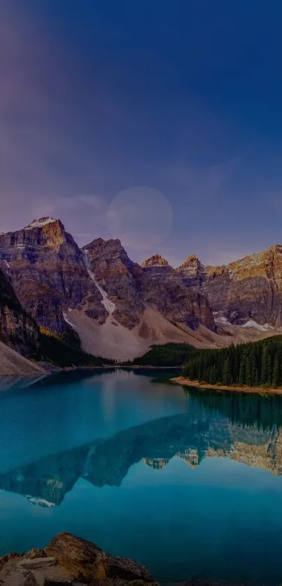 Scenic mountain lake with clear waters and blue sky.