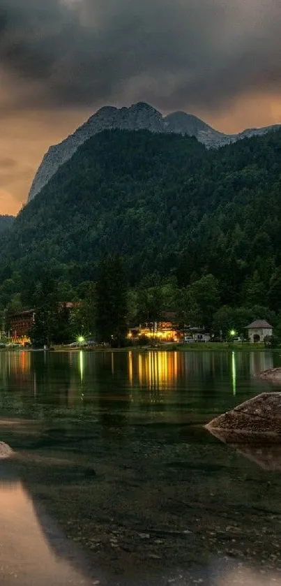 Serene mountain lake with lush trees and a calming sunset sky.
