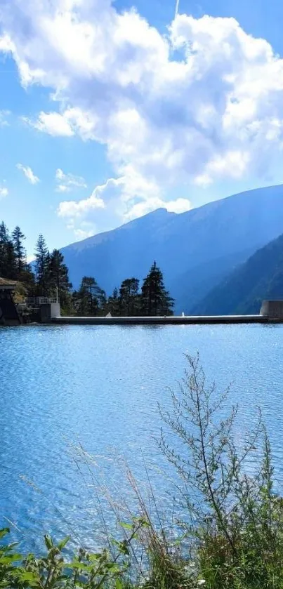 Serene mountain lake under a blue sky.