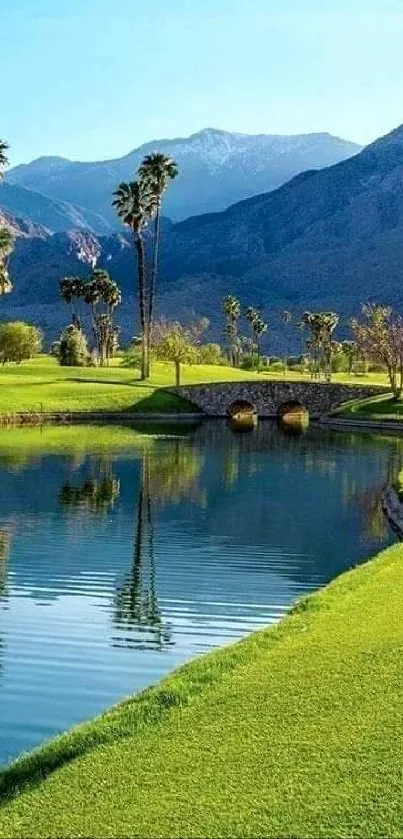 Serene mountain and golf course landscape wallpaper.