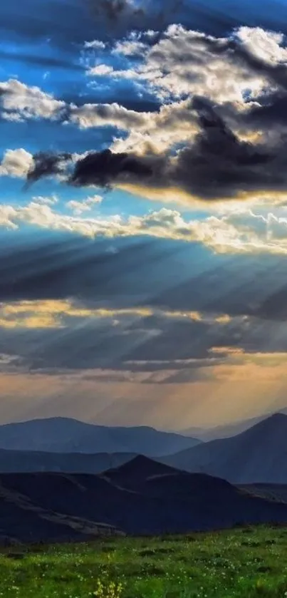 Serene mountain landscape with blue sky and clouds.