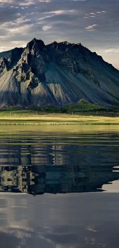 Mountain reflection on calm waters wallpaper