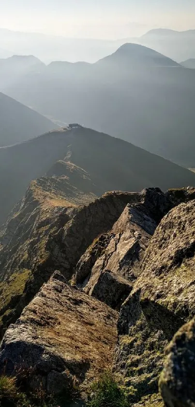 Mountain ridge view with distant peaks under a soft morning light.