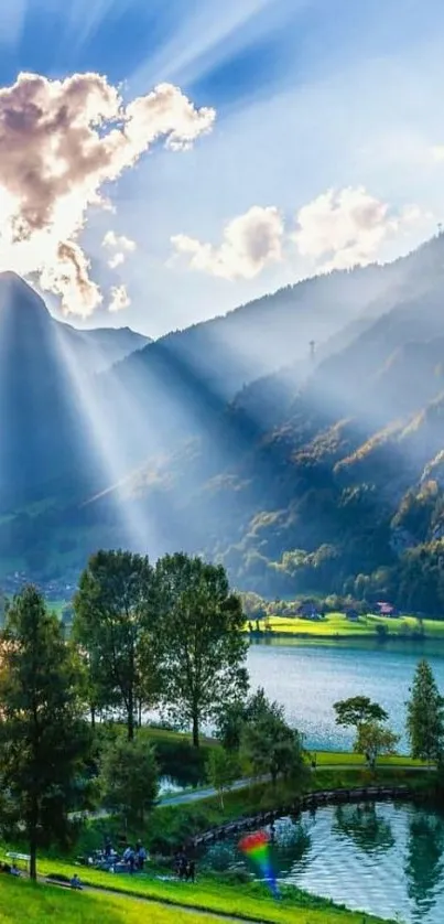 Serene sunrise over a mountain landscape with sunrays and vibrant scenery.