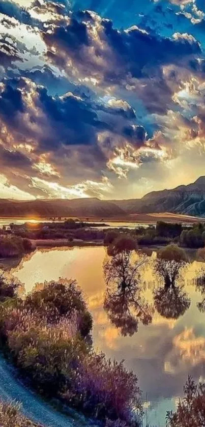 Scenic lake at sunset with hills and vibrant sky.