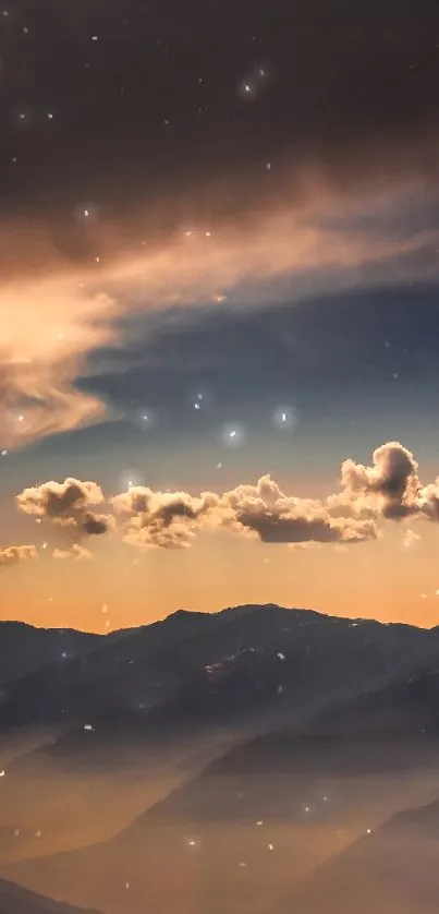 Scenic mountain sunset with glowing clouds and evening sky.