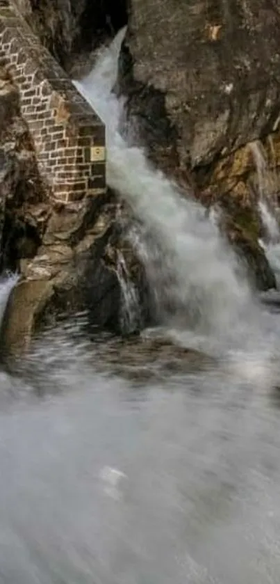 Serene mountain waterfall cascading over rocks.