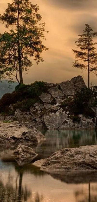 Serene rocky landscape with calming lake and trees at sunset.