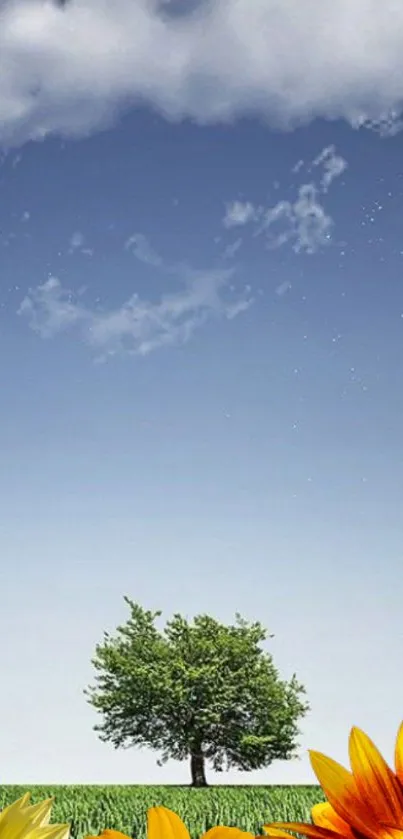 Wallpaper of a tree under a blue sky with flowers in the corner.