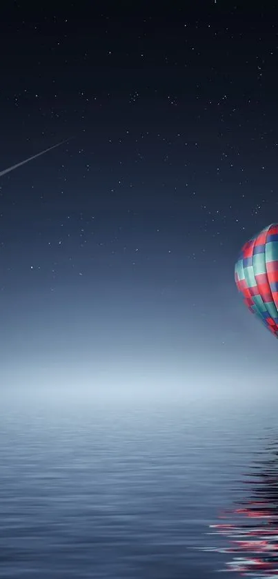 Hot air balloon floats over water under a starry night sky.