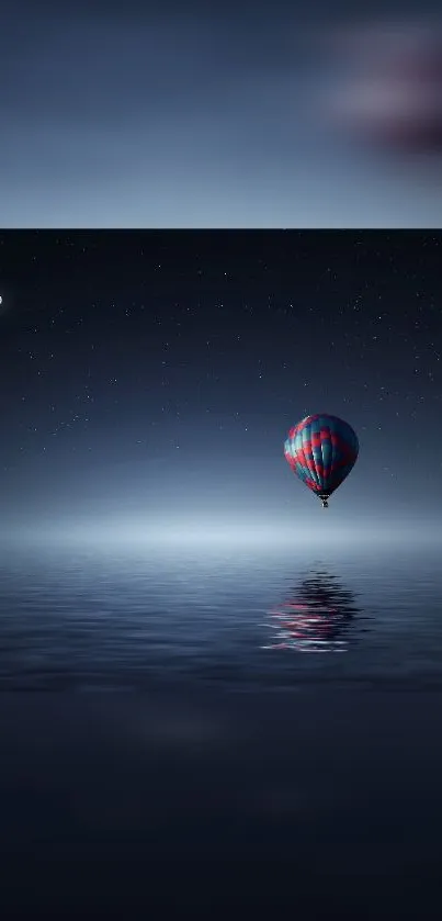 Hot air balloon over calm night waters under a starry sky.