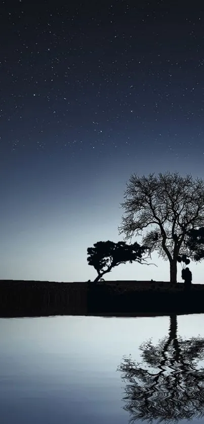 Serene night landscape with lake, silhouetted trees, and starry sky.
