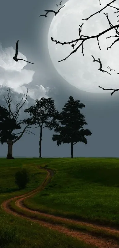 Serene night landscape with full moon, silhouetted trees, and tranquil field.