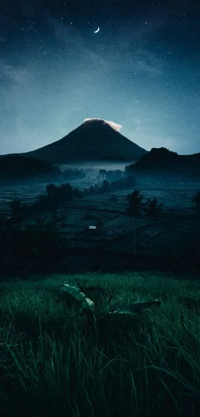 Majestic night view of a mountain under starry sky and crescent moon.